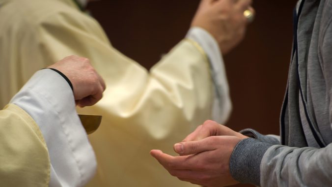 The Ministry of the Eucharist in Hospitals and Prisons