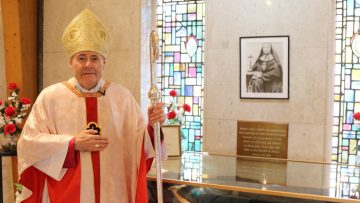 Bishop Davies at grave of Elizabeth Prout